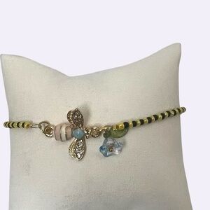 Gold Bee Charm Beaded Bracelet with Blue Flower Accent